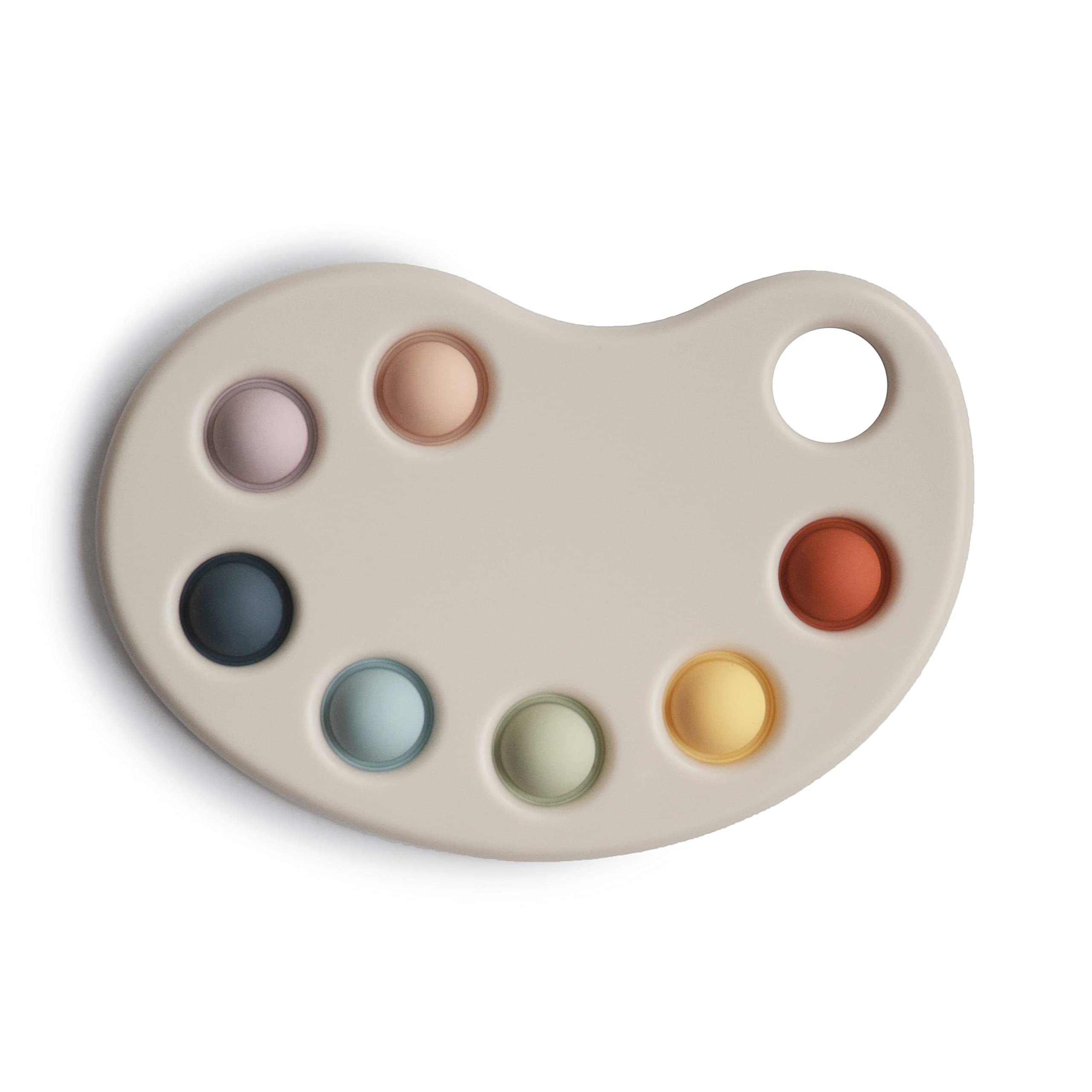 Mushie Paint Palette Press Toy wide shot shows colorful bubbles for sensory exploration