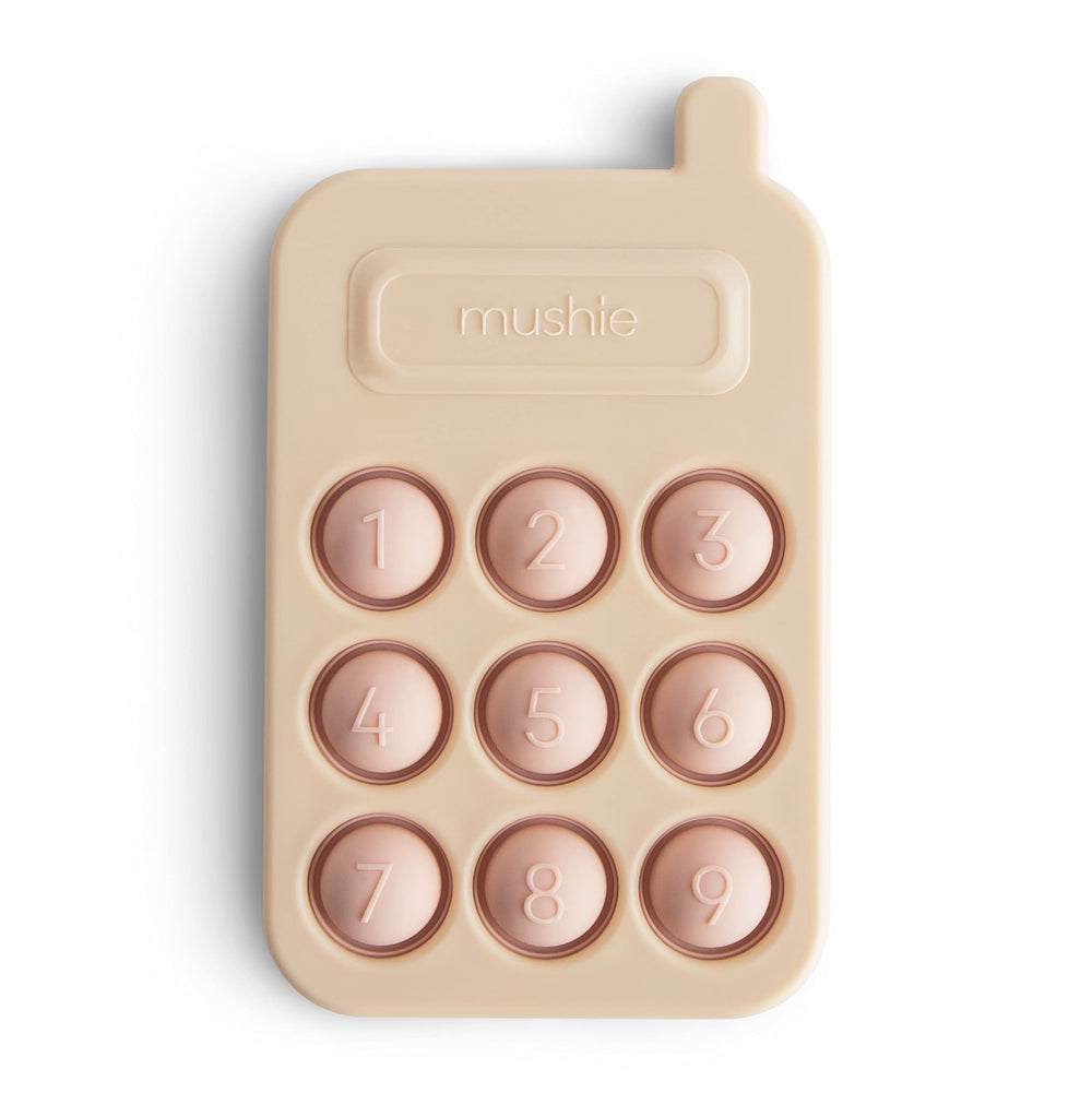 Mushie Phone Press Toy Blush bubbles close-up for tactile play and fine motor practice