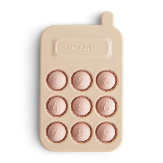 Mushie Phone Press Toy Blush bubbles close-up for tactile play and fine motor practice