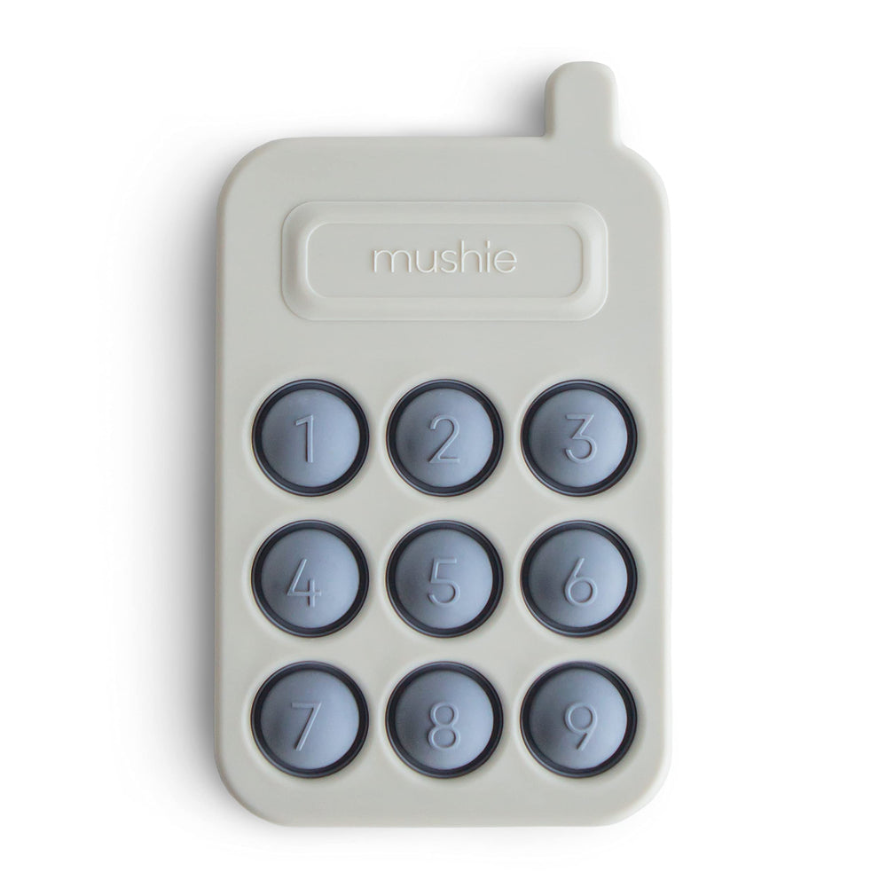 Mushie Phone Press Toy Tradewinds, front view, promotes tactile exploration and focus for toddlers