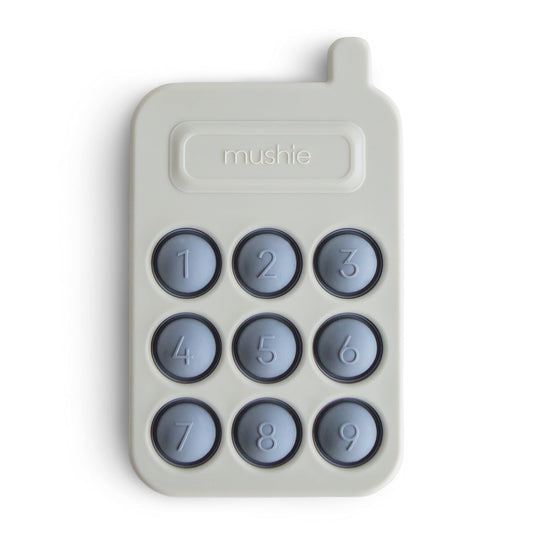 Mushie Phone Press Toy Tradewinds, front view, promotes tactile exploration and focus for toddlers