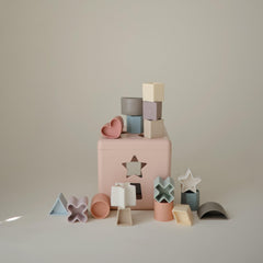 Mushie Shape Sorting Box Petal close-up highlights BPA-free plastic.