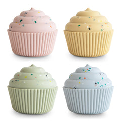 Mushie silicone cupcake toy 4-pack in bright colors for sensory play.