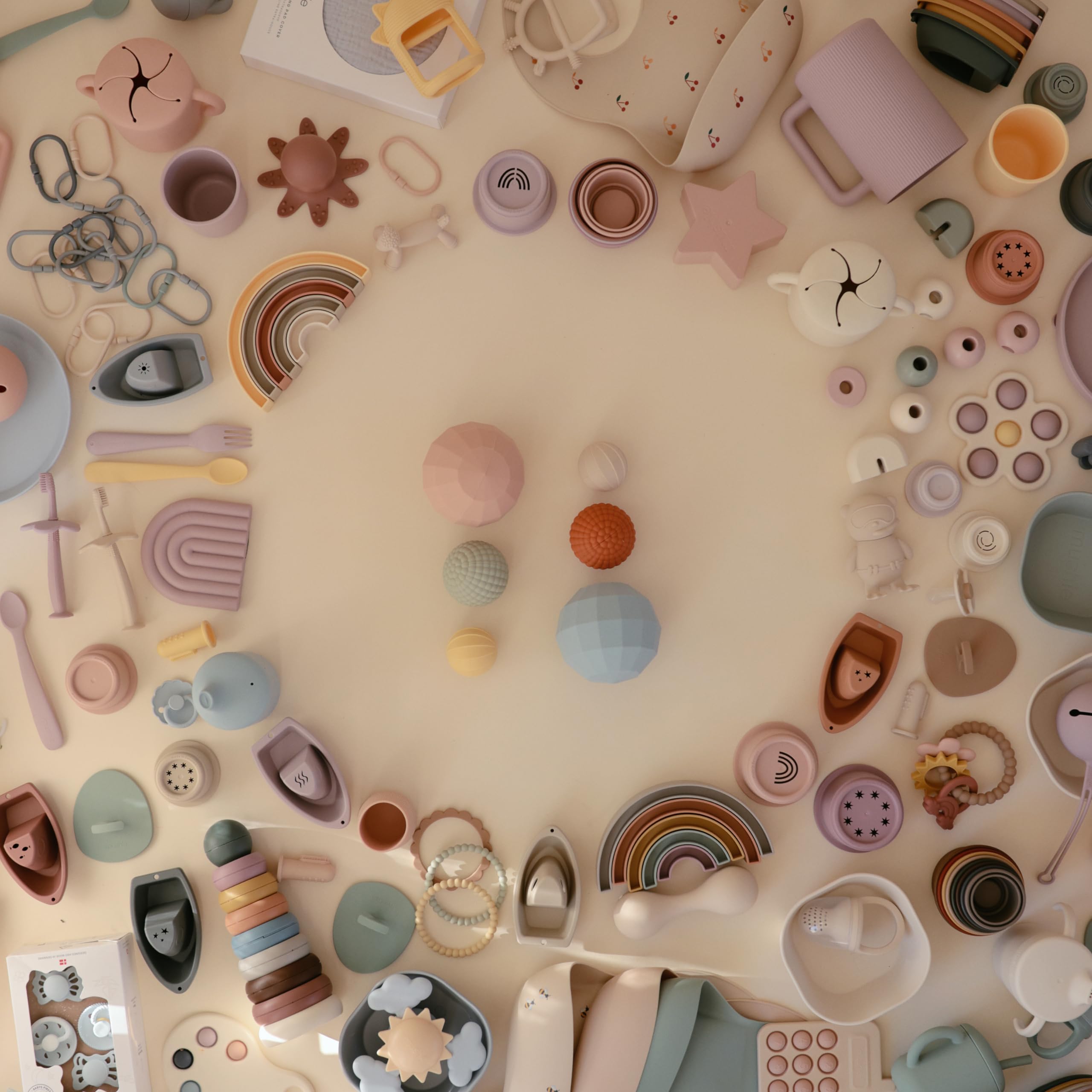 Mushie silicone nesting-spheres blush gift-pack for thoughtful, compact sensory play.