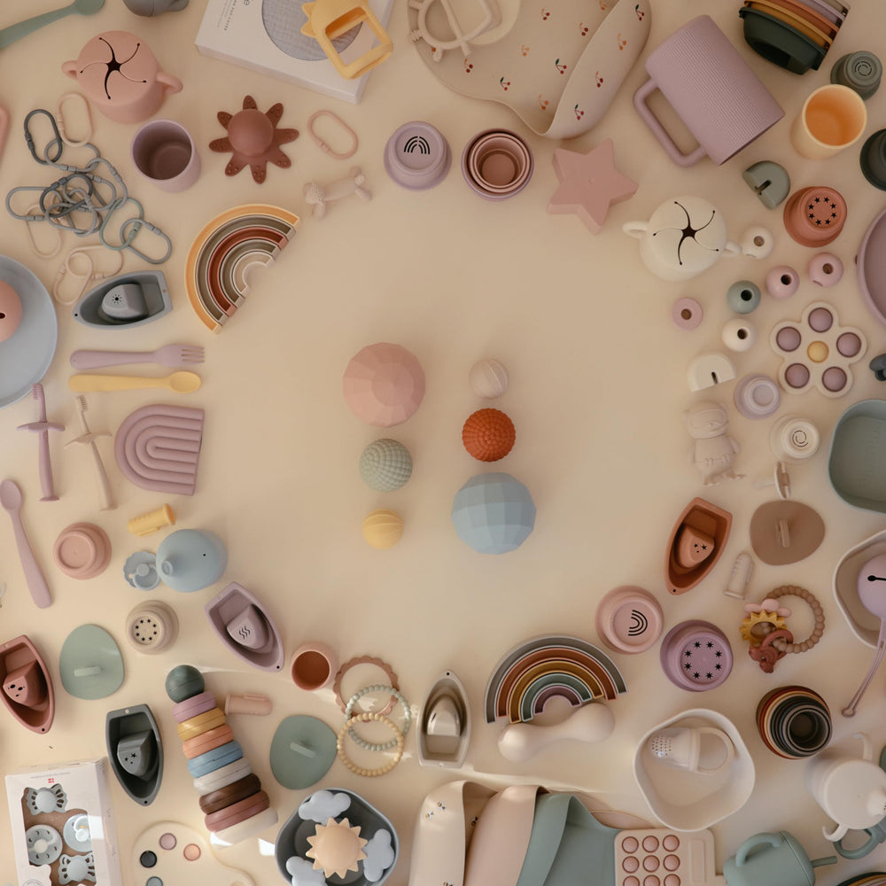 Mushie silicone nesting-spheres blush gift-pack for thoughtful, compact sensory play.