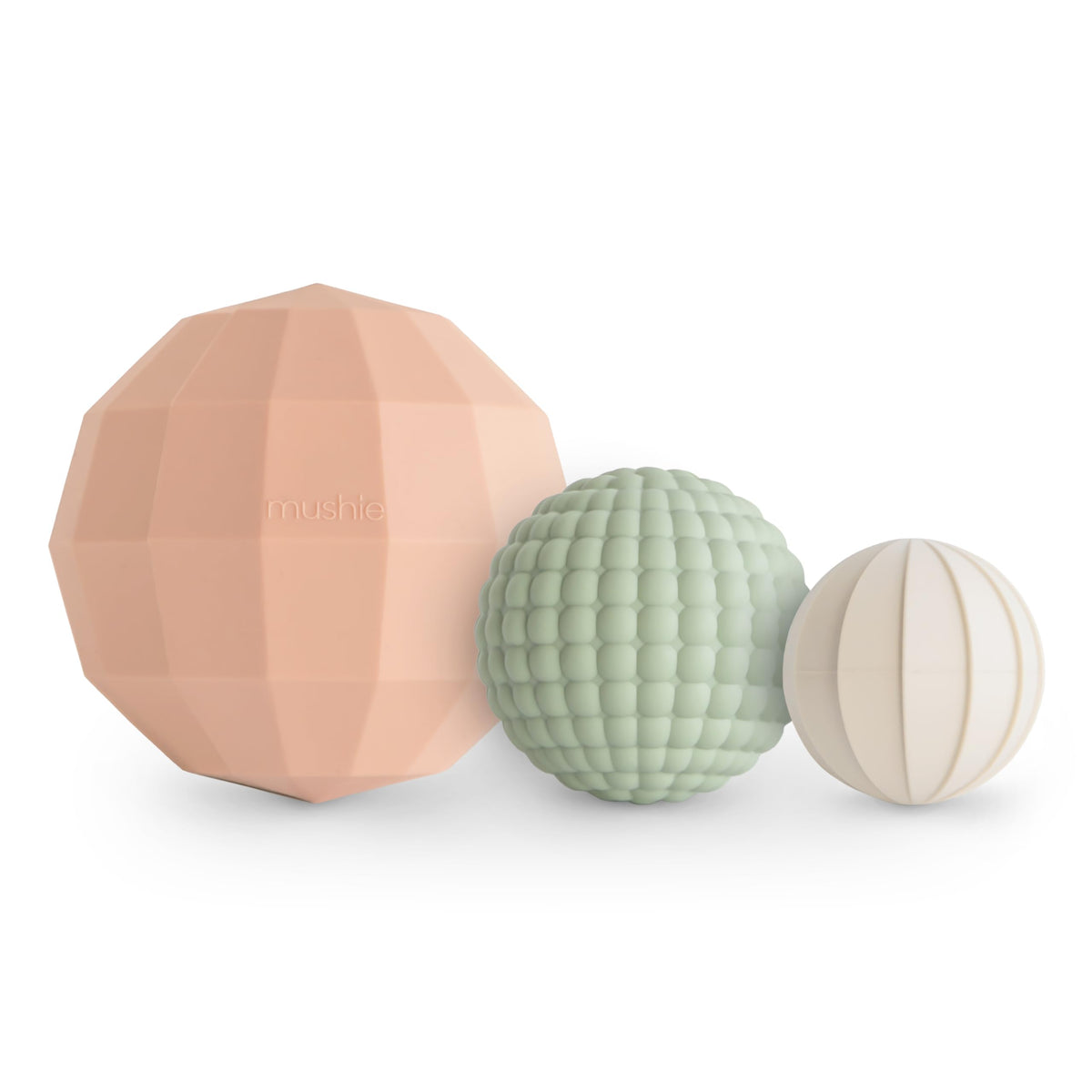 Mushie silicone nesting spheres blush pack-3 for soothing tactile play.
