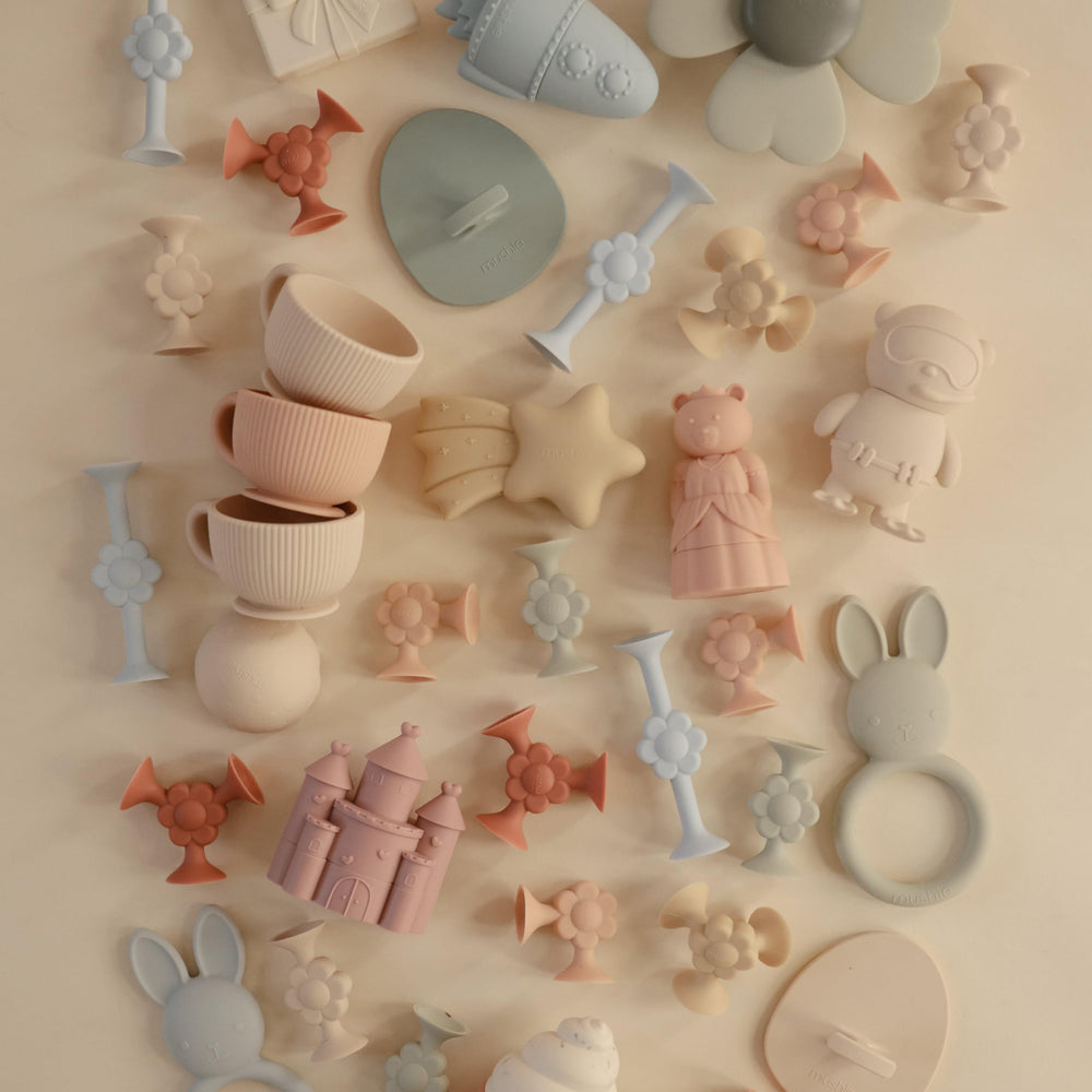 Mushie silicone-safe donut toy designed for curious kids and calm play.