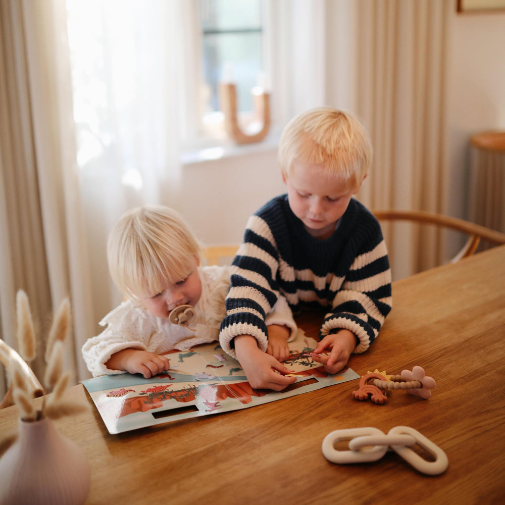Mushie Space stickers are reusable, encouraging endless creative rearrangements.