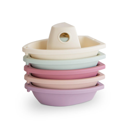 Mushie Stackable Bath Boats Petal: five linked boats for imaginative bath play.