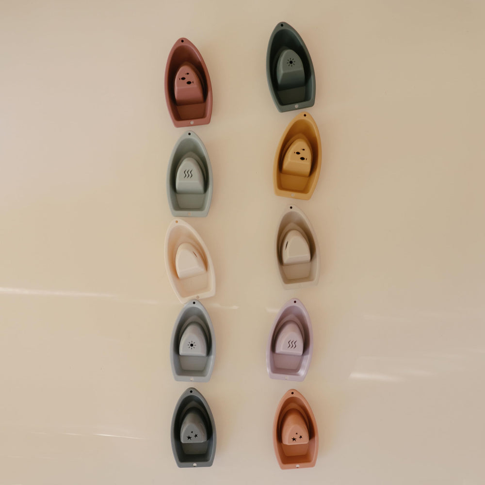 Mushie Bath Boats Petal drying after bath for safe storage.