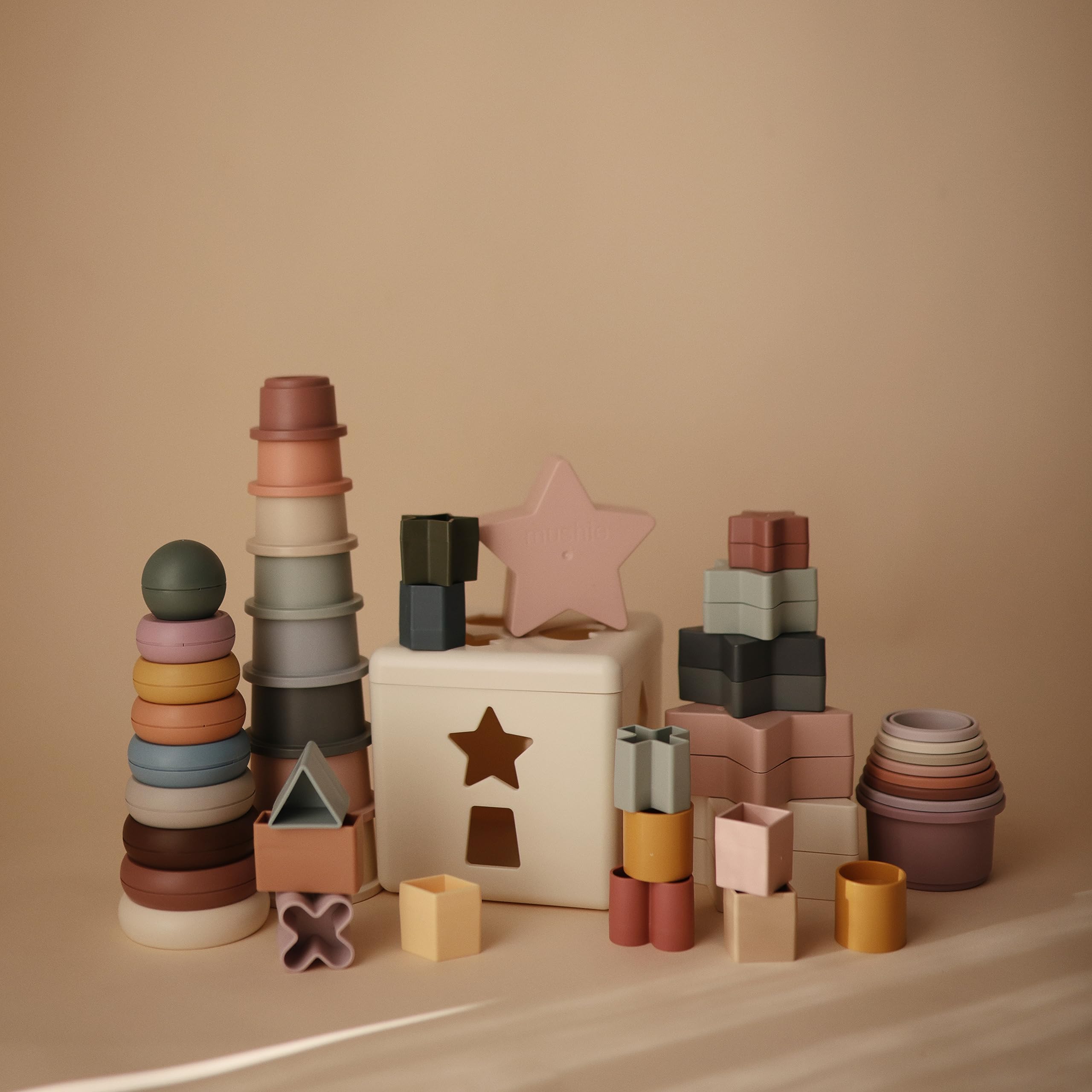 Mushie Stacking Rings Toy 10-piece look encourages interactive play