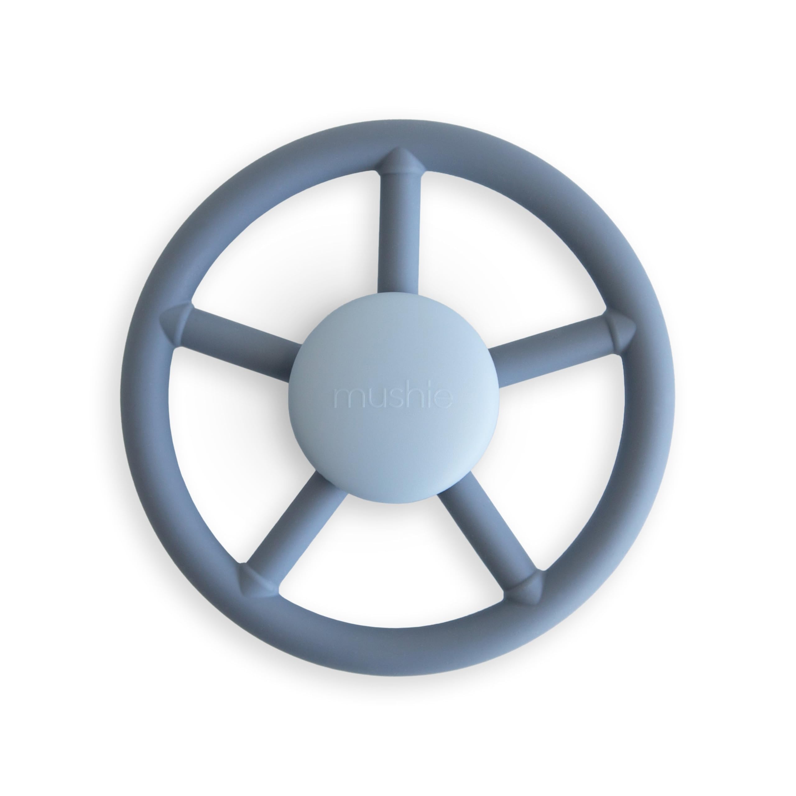 Mushie Wheel suction spinner toy on bath surface for sensory play.