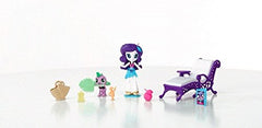 My Little Pony Rarity reads a book, inviting imaginative calm seaside moments.