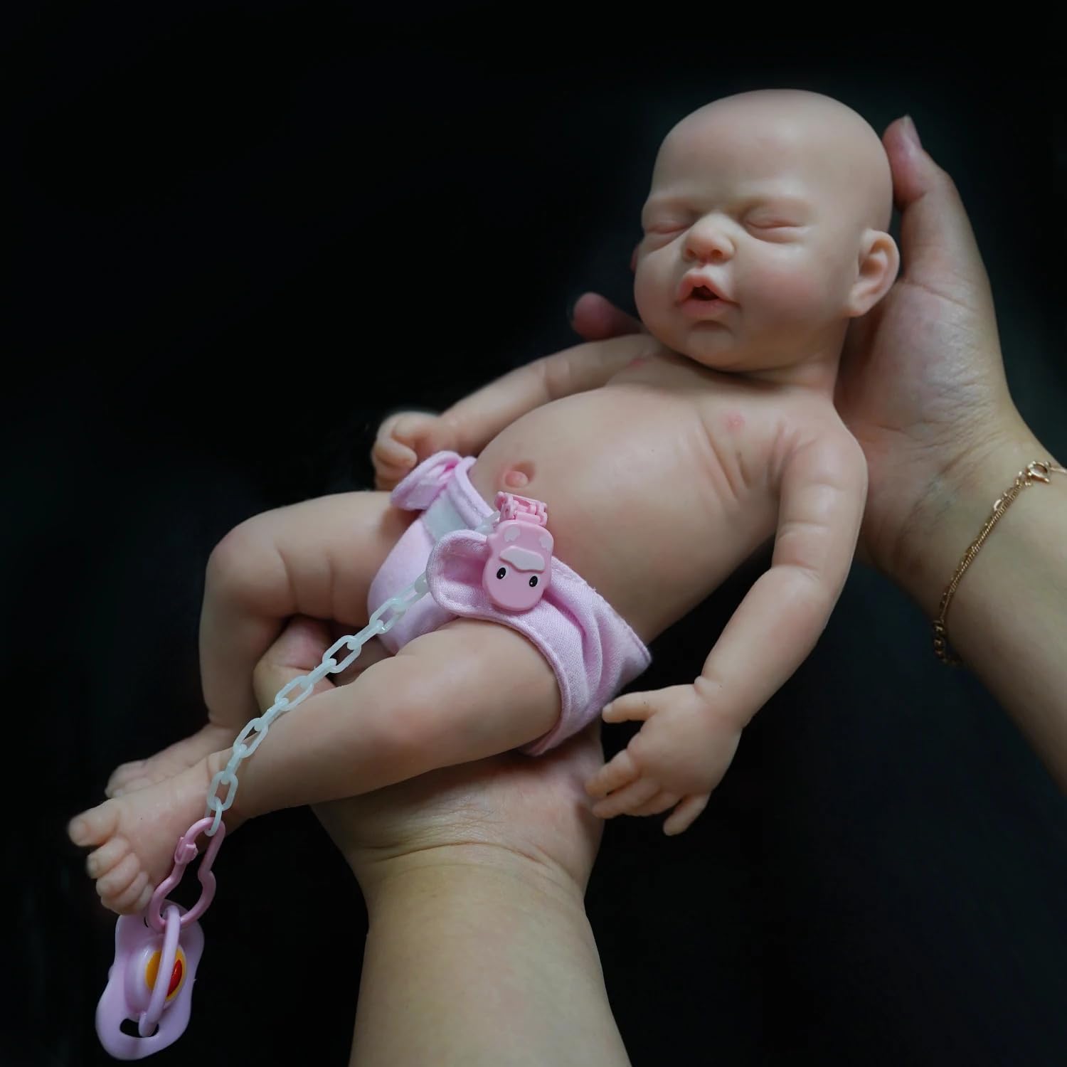 MYREBABY 12-inch full silicone doll close-up shows lifelike skin and form.