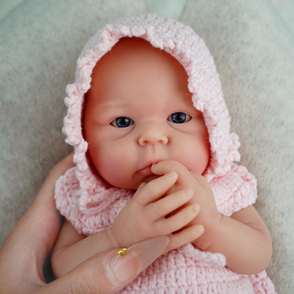 MYREBABY Carina 12-inch micro preemie doll ready for imaginative play and care routines.