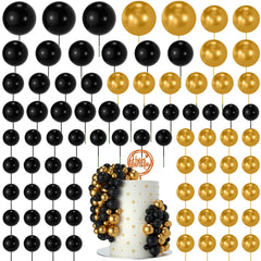 NACHLYNN cake balls decorations in black and gold toppers for elegant cakes.