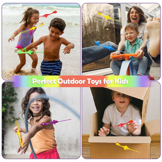 Namii W rubber chicken slingshot in action soaring across yard or room.