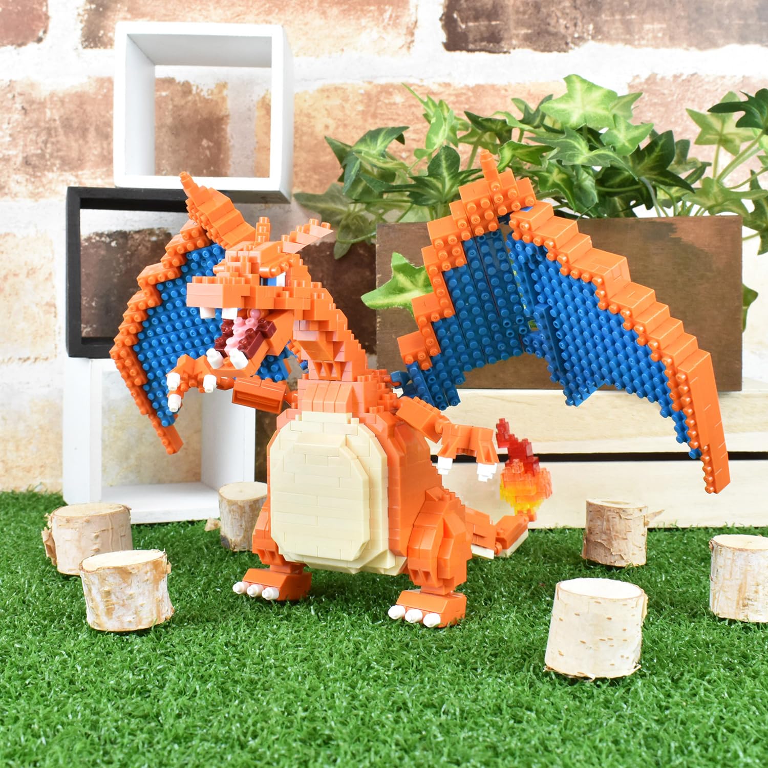 Nanoblock Charizard Deluxe Edition compact art fits in hand.