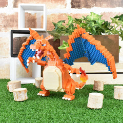Nanoblock Charizard Deluxe Edition compact art fits in hand.