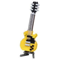 Nanoblock electric guitar yellow collection kit on desk with precise fit.