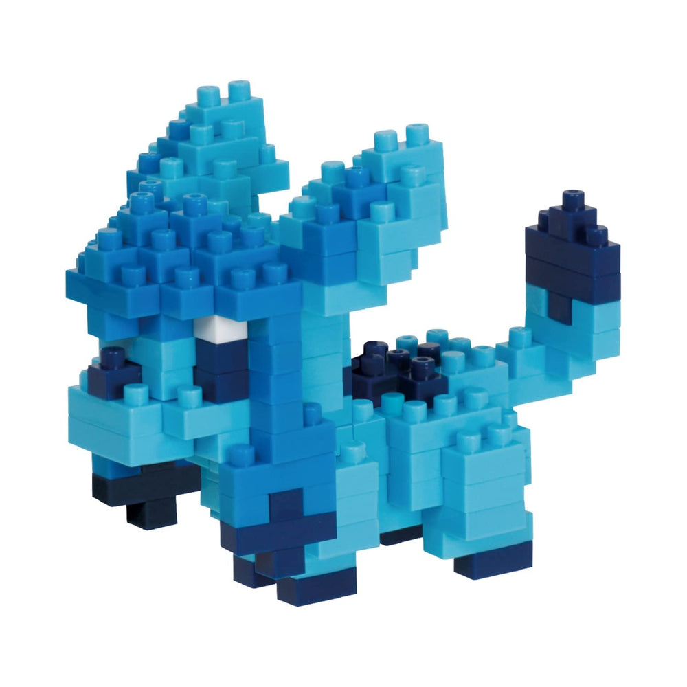 Nanoblock Glaceon assembly close-up, tiny bricks create a compact collectible for your desk.