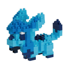 Nanoblock Glaceon assembly close-up, tiny bricks create a compact collectible for your desk.