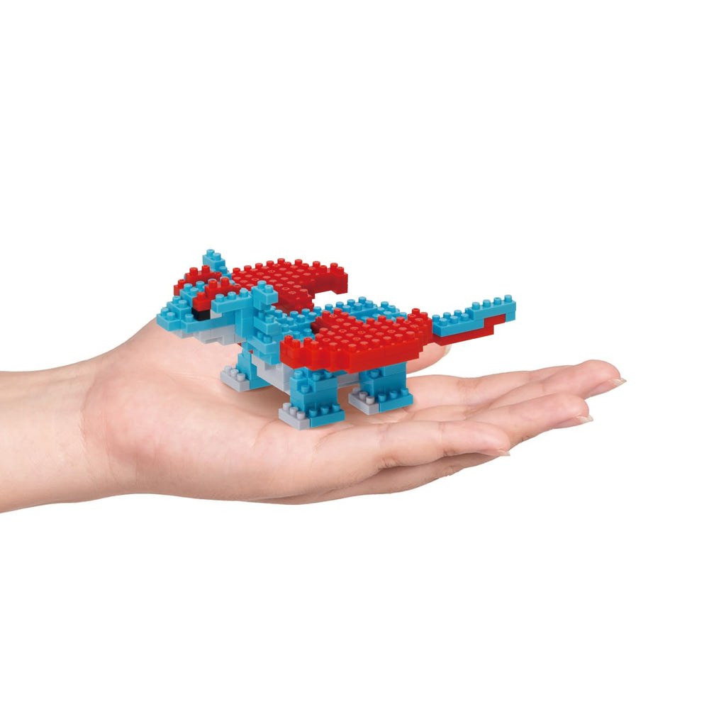 Handheld nanoblock Salamence model showing palm-size build and tactile enjoyment.