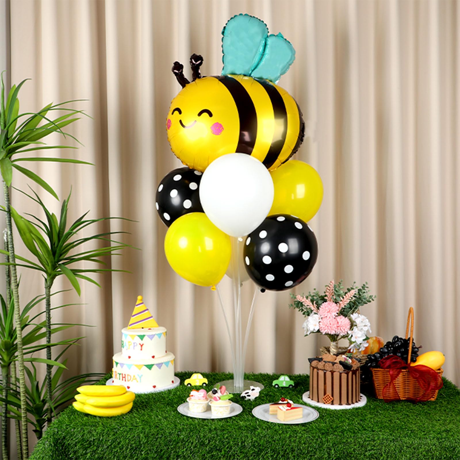 Naozinebi matte white balloons provide clean backdrop for photos