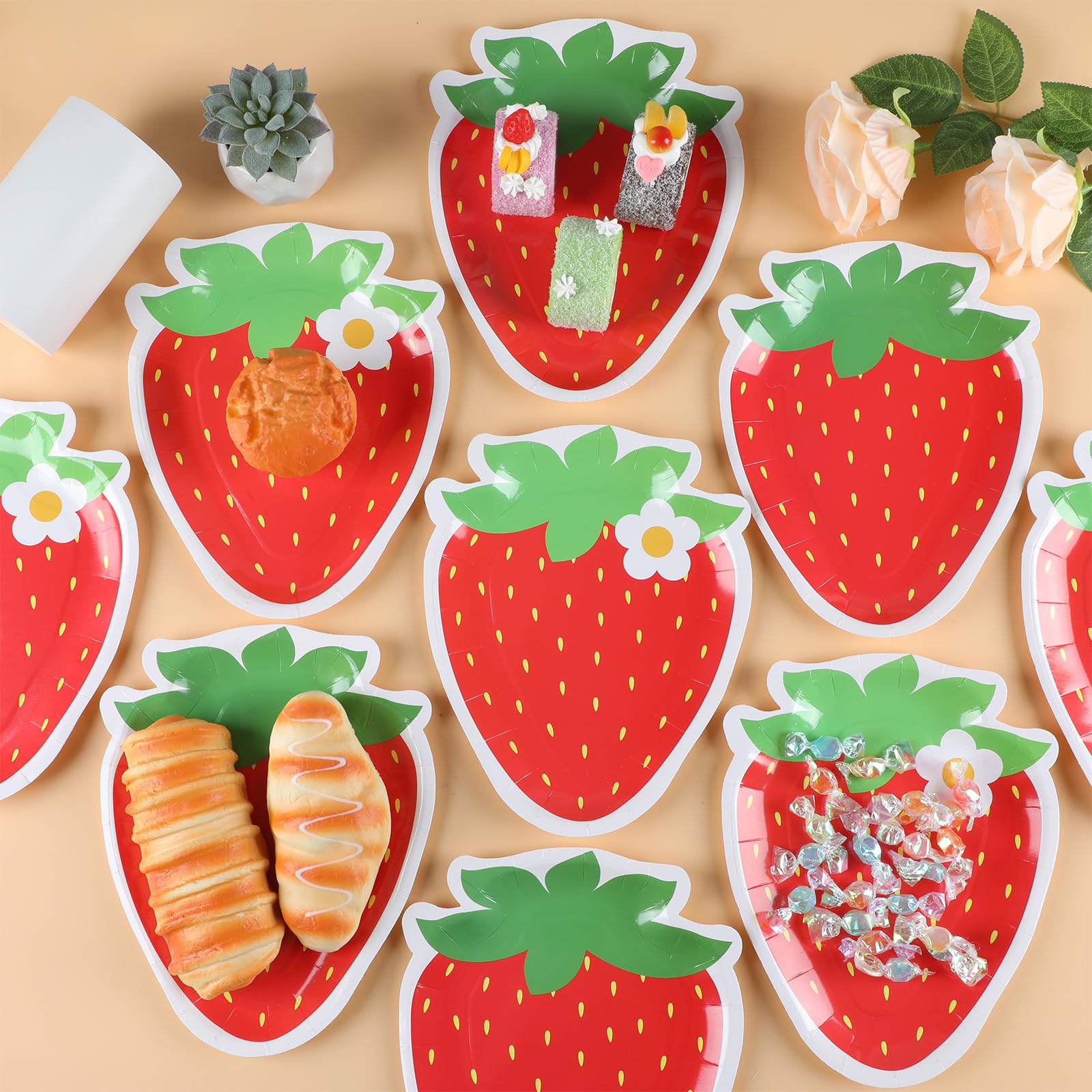 Naozinebi sturdy strawberry paper plates; durable for serving snacks.