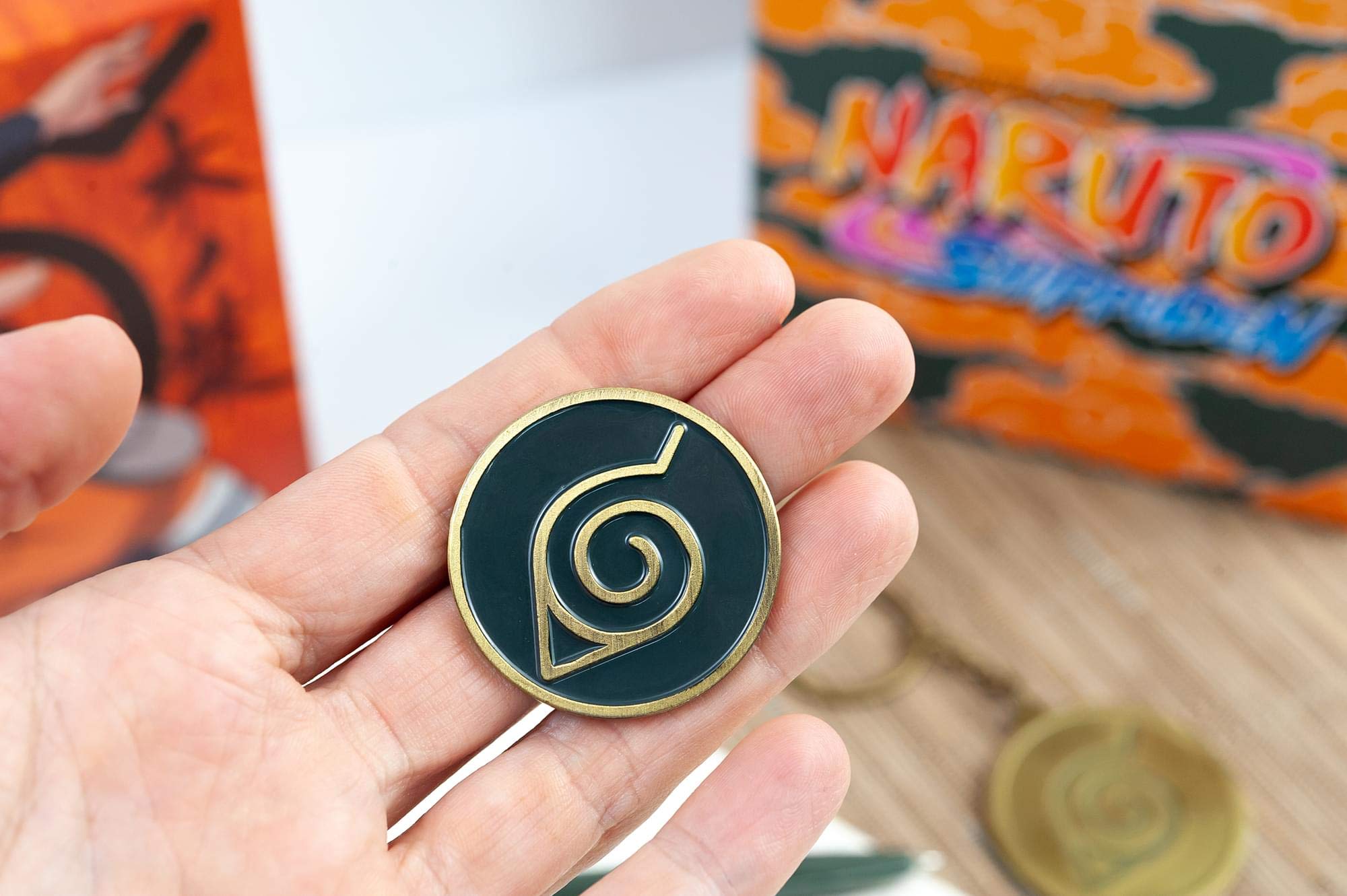 Naruto Looksee enamel pin adds subtle fandom to bags or jackets.