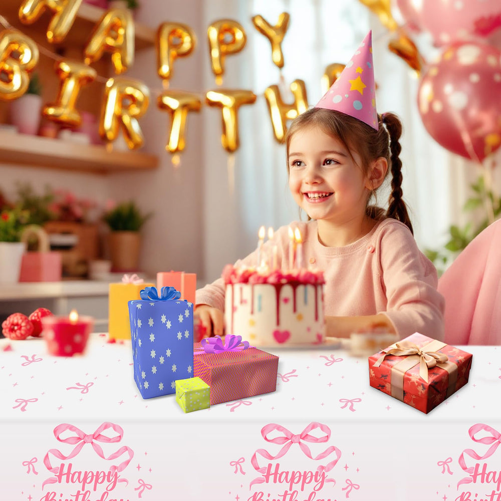 NatNarr Coquette pink bow tablecloth backdrop setup for photos and celebrations.