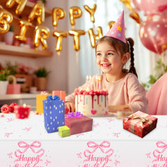 NatNarr Coquette pink bow tablecloth backdrop setup for photos and celebrations.