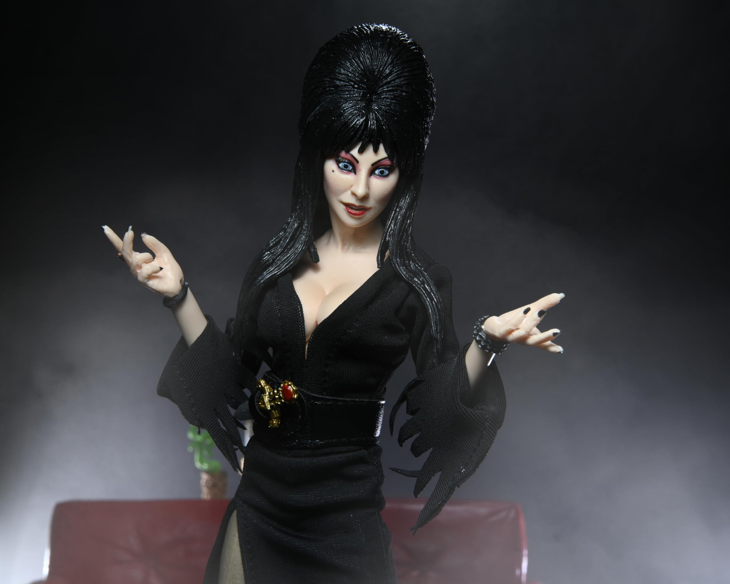 NECA Elvira 8-inch figure with figure stand supports dynamic posing.