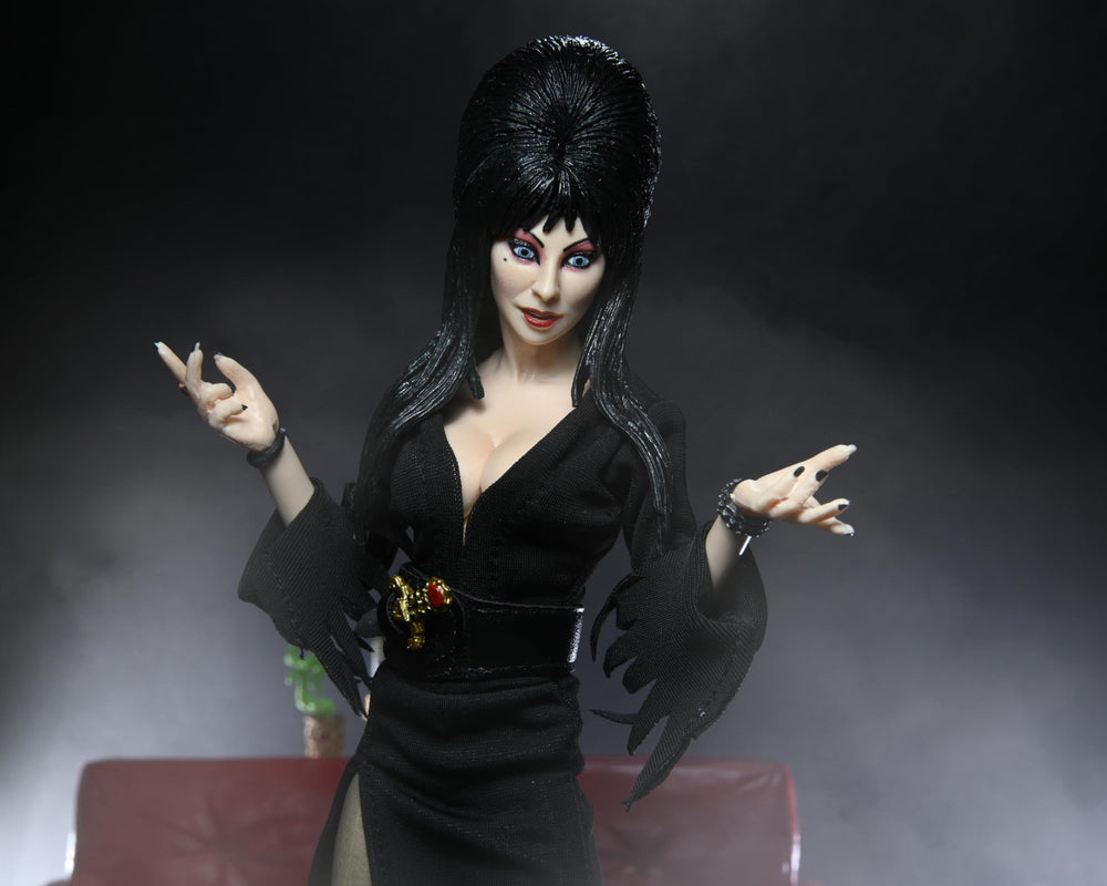 NECA Elvira 8-inch figure with figure stand supports dynamic posing.