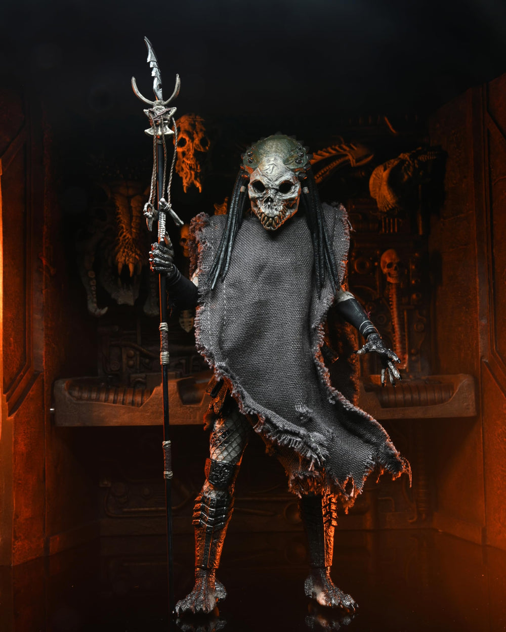NECA Predator Shaman hatcheted skull accessory enhances realism.
