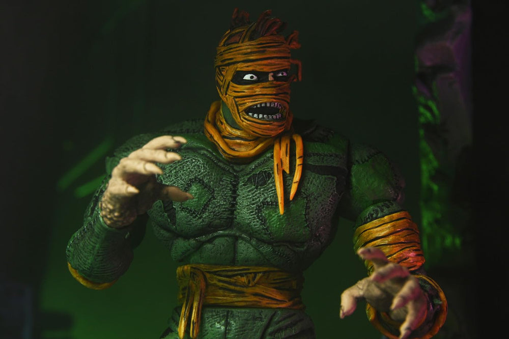 NECA Rat King figure showing two interchangeable heads for different moods