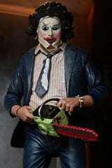 NECA Leatherface weapons set including chainsaw, knife, hammer, and meat plate.