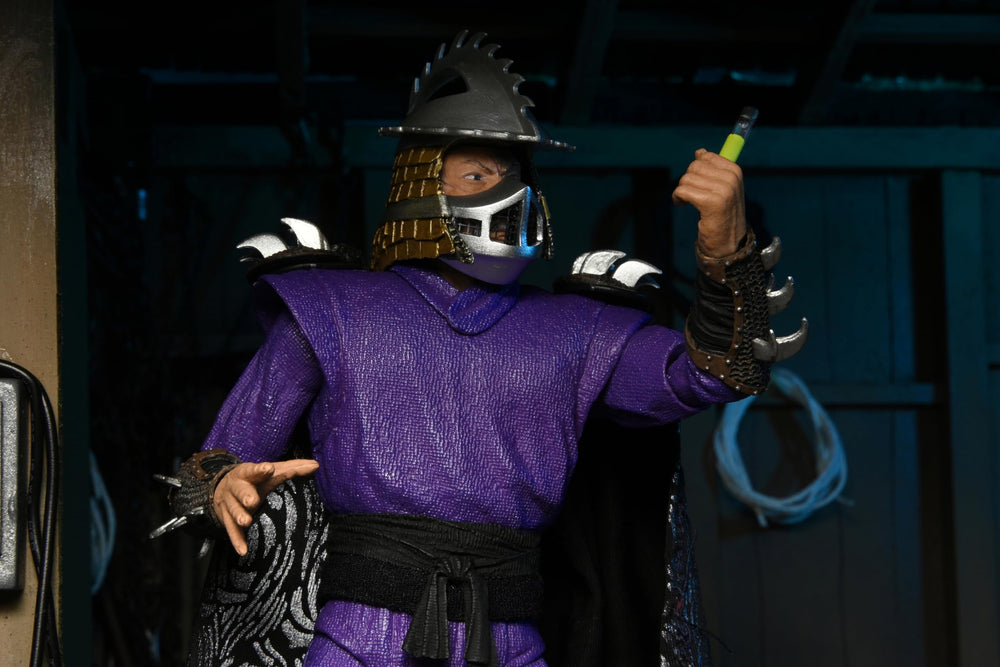 NECA TMNT Shredder back view highlighting silhouette and packaging.