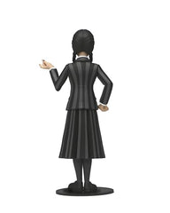 NECA Wednesday Addams in classic dress captures iconic look for shelf dioramas.