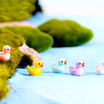 Neec yellow resin duck figurine for playful home DIY decor.