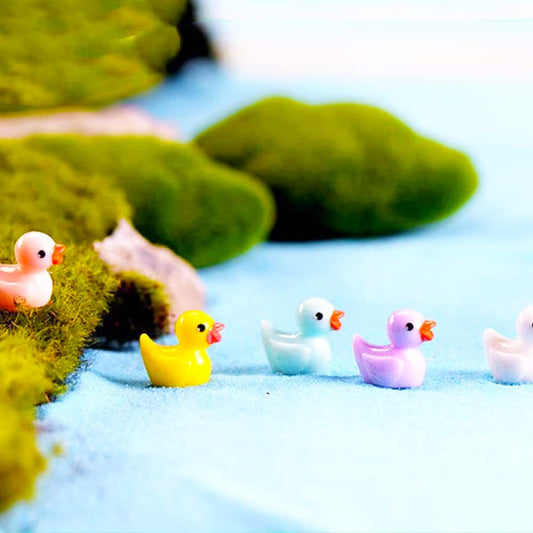 Neec yellow resin duck figurine for playful home DIY decor.