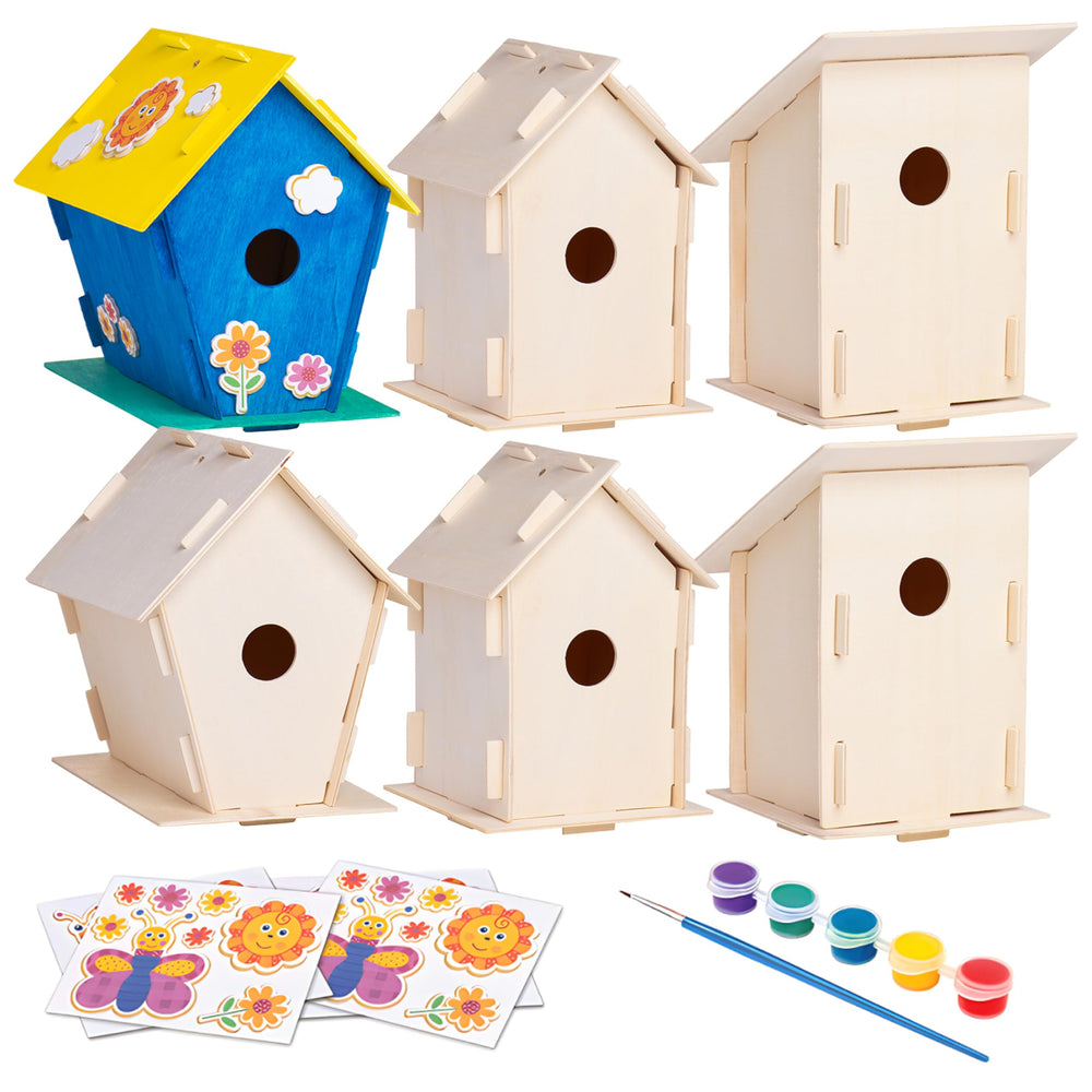 Neliblu birdhouse kit being painted by kids for colorful garden decor