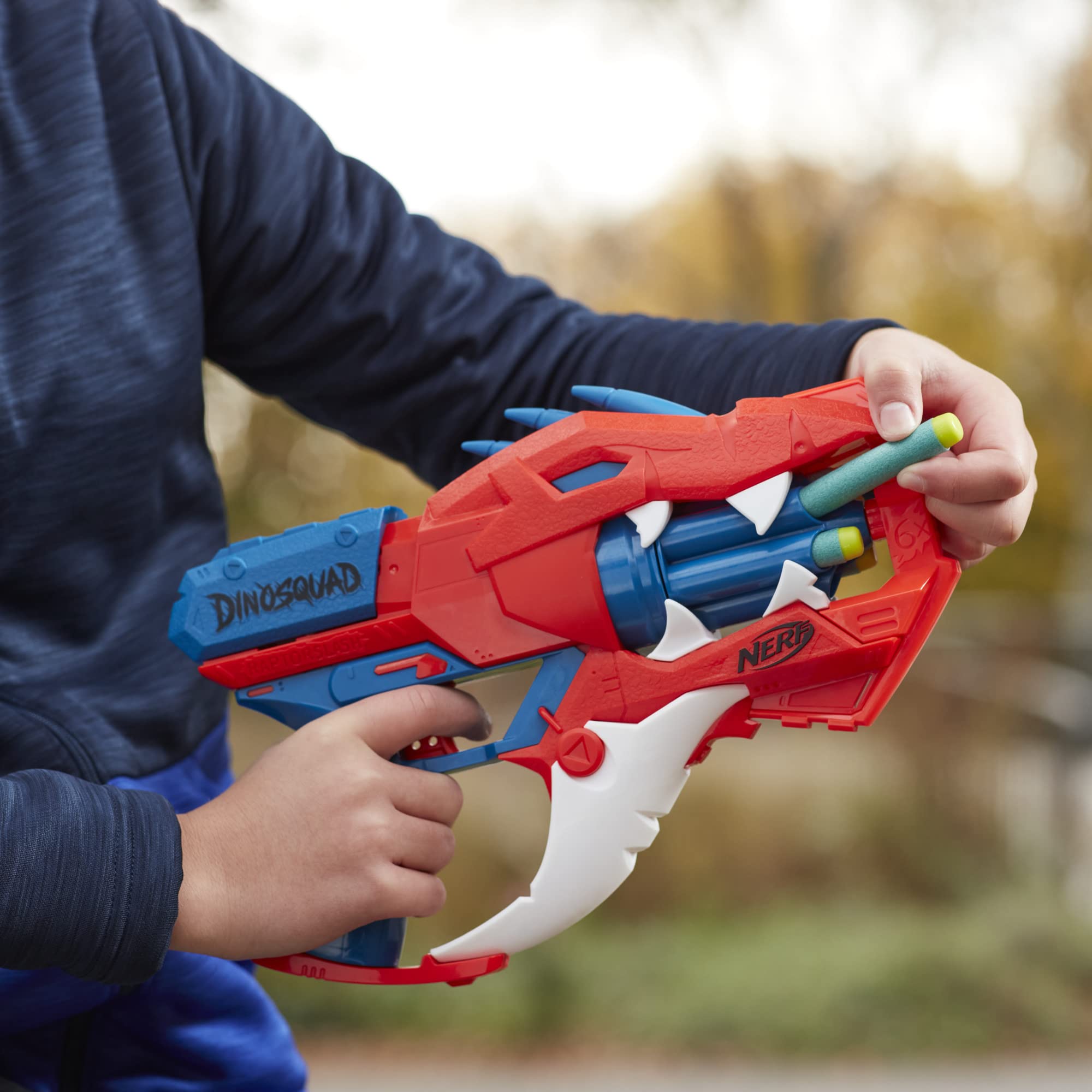 Nerf DinoSquad Raptor-Slash slam-fire action launches six darts