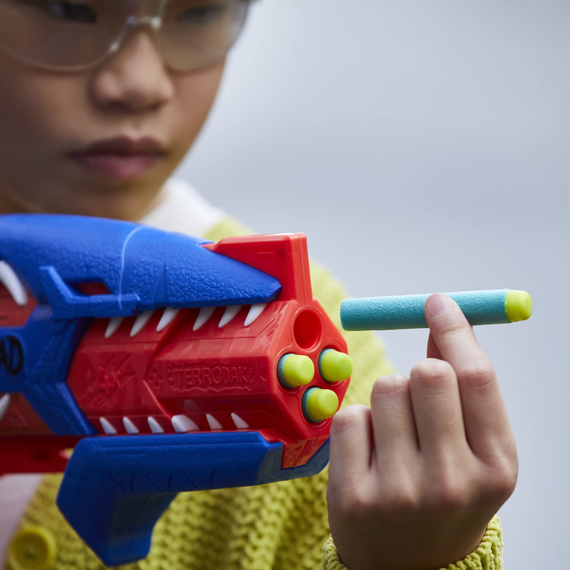 NERF DinoSquad Terrodak 8-dart storage enables fast reloads during play.