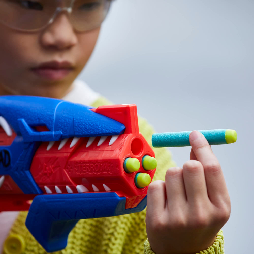 NERF DinoSquad Terrodak 8-dart storage enables fast reloads during play.