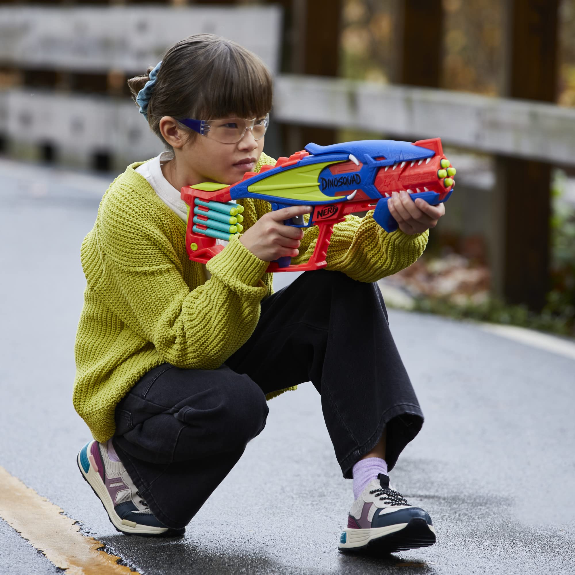 NERF DinoSquad Terrodak pump-action mechanism simplifies firing for kids.