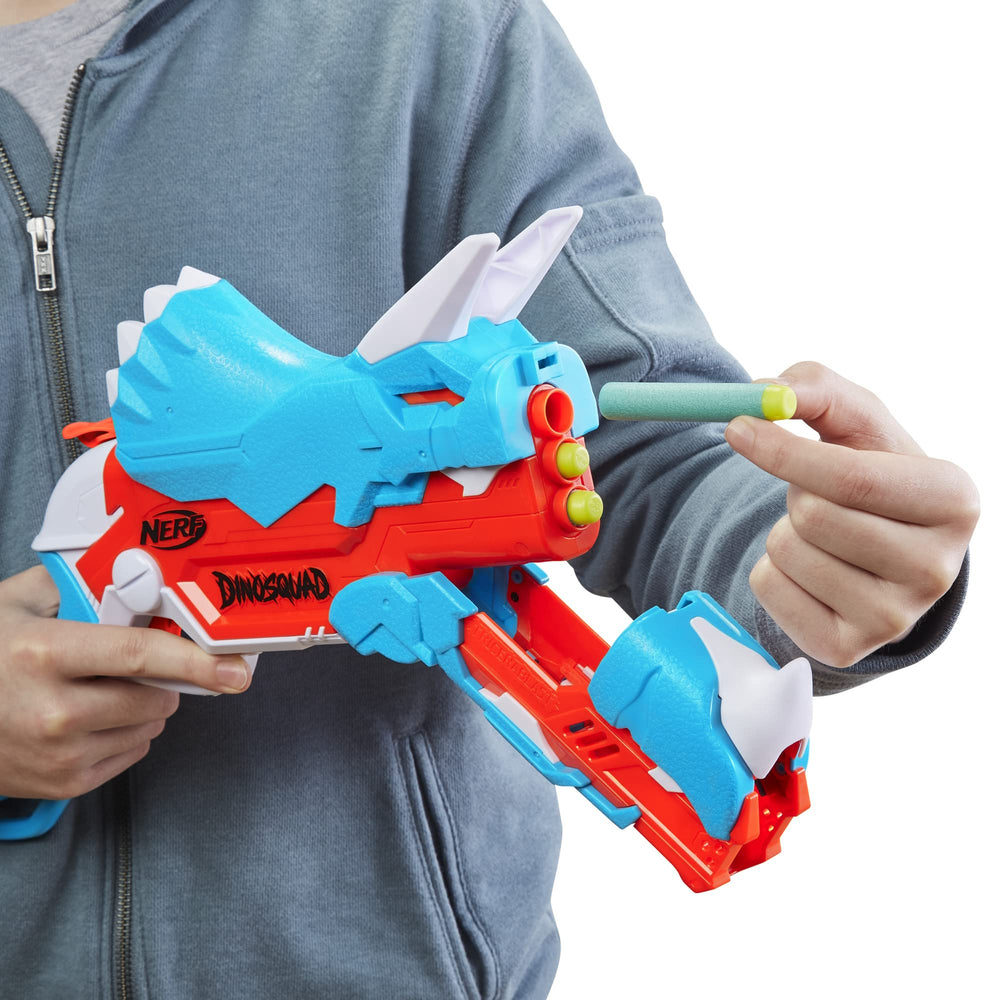 Nerf DinoSquad Tricera-Blast hammer-priming for smooth single-dart launches.