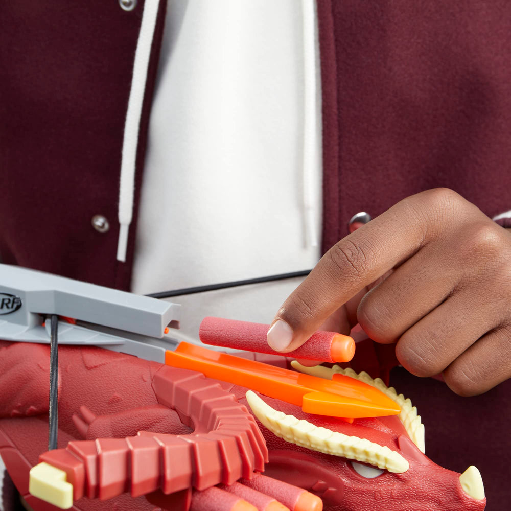 Nerf crossbow features red dragon styling for immersive role-play.
