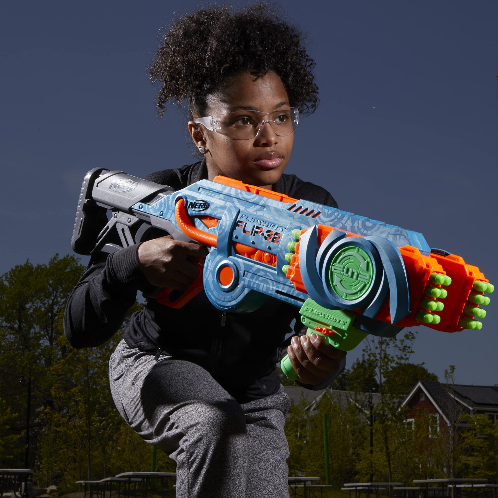 Nerf Elite 2.0 Flipshots ergonomic handle in action during outdoor play