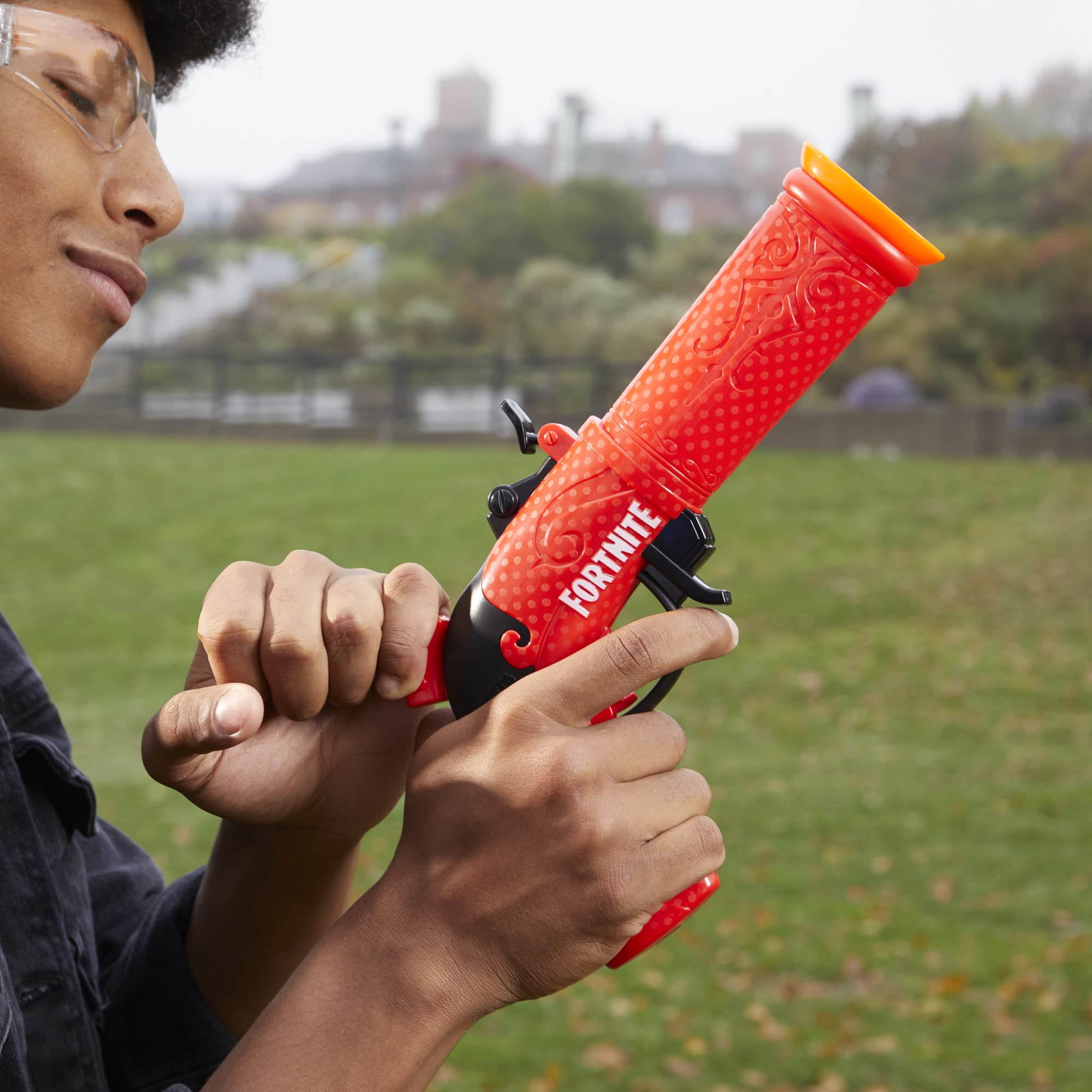 Nerf Fortnite dual pack includes 6 Elite darts for ongoing backyard battles.